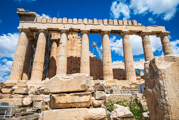 Fototapeta premium The Parthenon on the Acropolis of Athens undergoing conservation work, highlighting ongoing efforts to preserve one of the world's most important cultural heritage monuments. 2