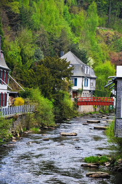 Red Footbridge Over the Rur River in Historic Monschau, Germany