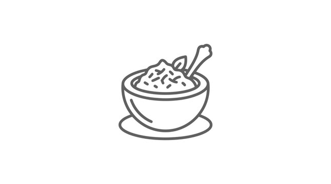 Simple bowl of rice porridge with garnish and spoon.