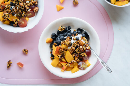 Spoon in bowl of muesli