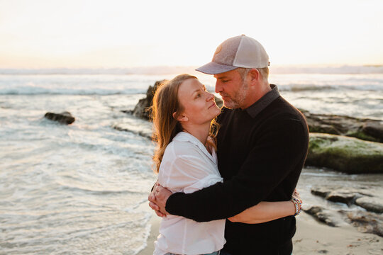Mom and Dad embrace 