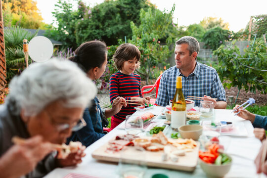 Family Eating Together Garden
