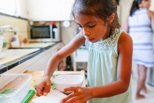 Girl Preparing Food with Mom Kitchen 