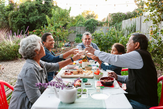 Eating Together Diverse Family Patio
