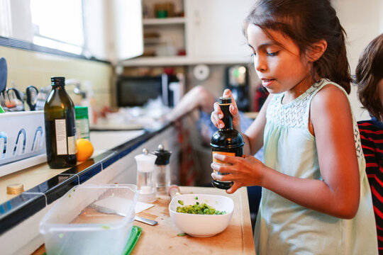 Kid preparing food in the kitchen