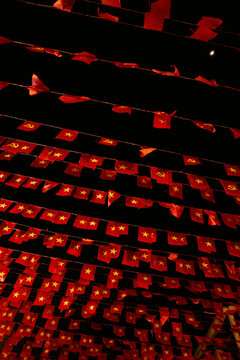 Bright red flags create a festive atmosphere in Vietnam