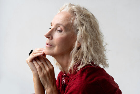 Profile of blonde senior woman