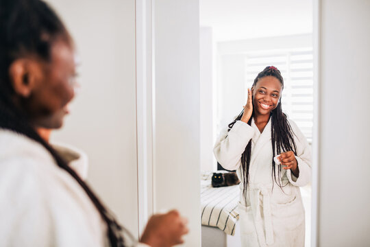 Home portrait of happy african american woman after beauty routine