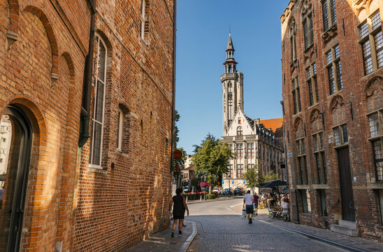Historic Architecture in a Charming Street of Bruges During Daylight