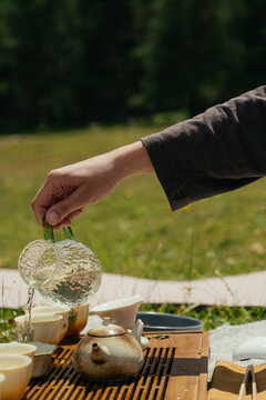 Tea ceremony takes place on a sunny day in the park