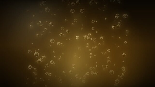 Golden bubbles rising in dark amber liquid