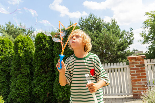 The boy with soap bubbles