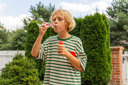 The boy with soap bubbles