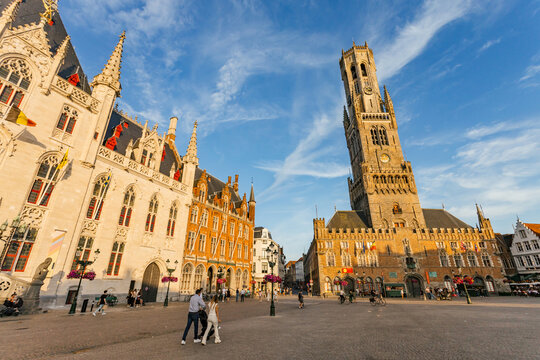 Exploring the Historic Square in Bruges at Sunset