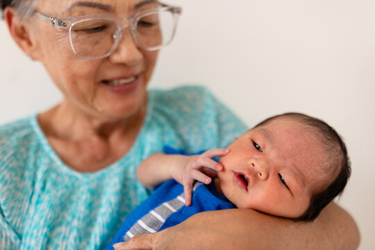 Newborn grandson with grandma