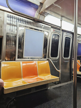 Subway Interior Showing Seating and Map on a Quiet Day