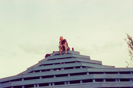 Man standing on top of a pyramid
