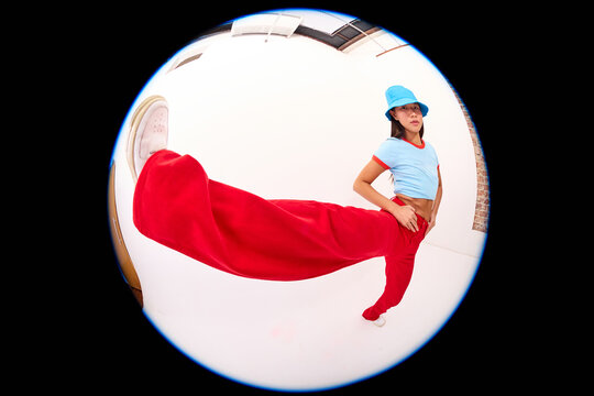 Woman Kicking Toward Camera Fisheye