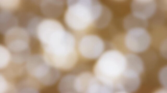 Abstract warm golden bokeh lights shimmering background