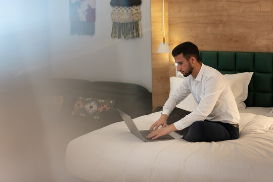 Working on Laptop in Hotel