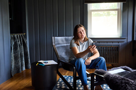 Woman working in stylish interior at home 