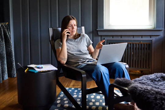Woman working in stylish interior at home 