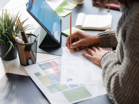 Woman working with documents at office 