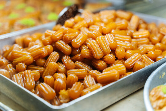 Tray of syrup-soaked tulumba pastries