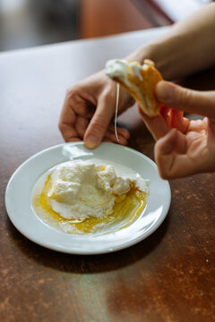 Clotted cream with honey on a white plate 