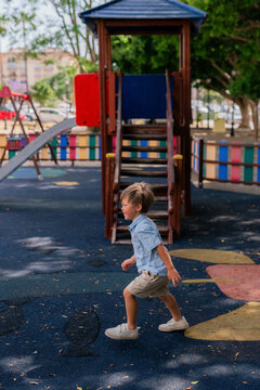 Boy running at playground 