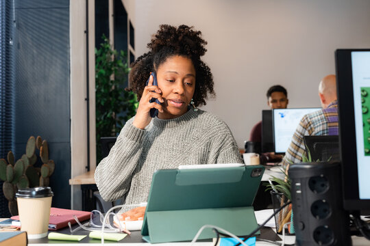 Woman multitasking at work 