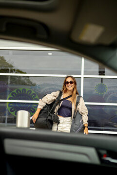 Woman arriving at airport pickup in Northern Rivers Australia