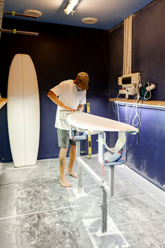 Surfboard shaper sanding blank