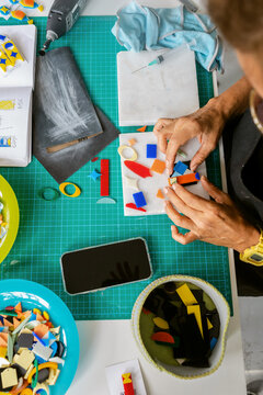 Anonymous Crafting With Colorful Materials 