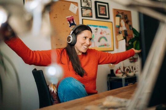 Excited Woman Celebrating Success During Video Call