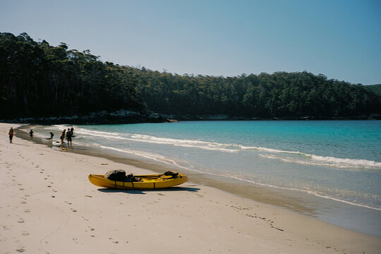 Anonymous people prepare kayaks to 