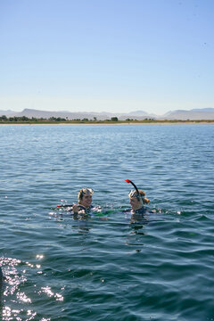 Mother And Daughter travel Snorkeling 
