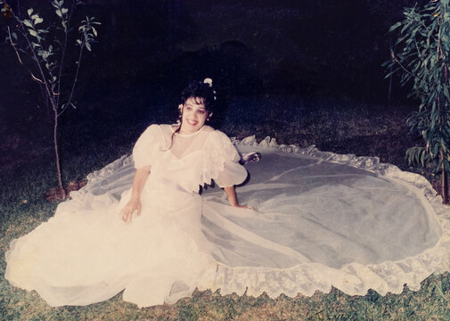Bride in white wedding dress from the 1990s
