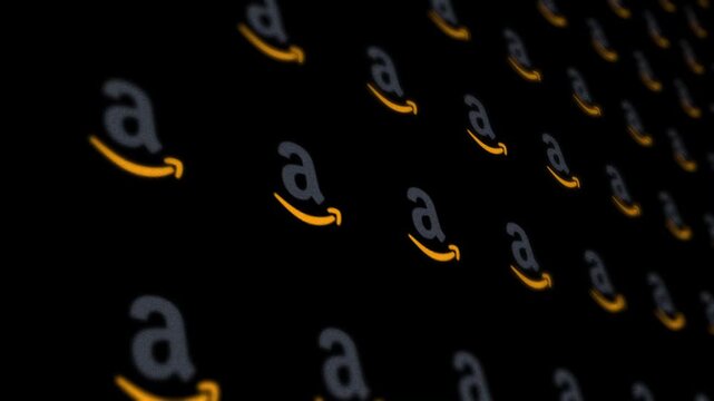 Amazon company logo icons in a digital grid background, editorial only