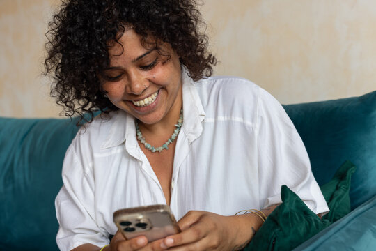 happy smiling woman using smartphone, typing message