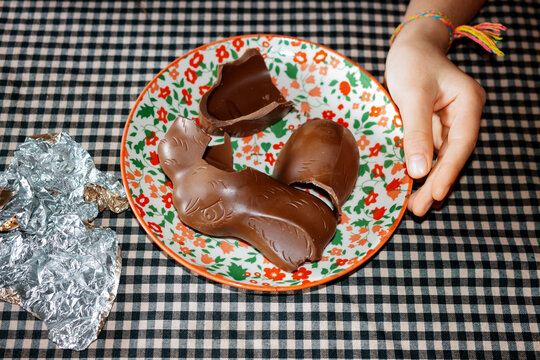 Child Enjoying chocolate Easter bunny