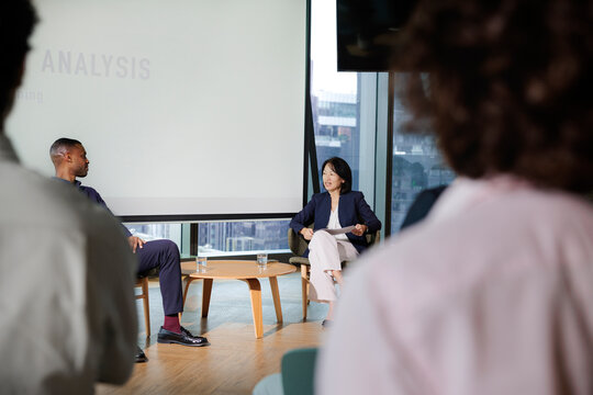 Panel discussion with diverse speakers and audience.