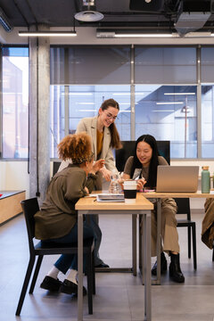 Team collaboration in modern office setting