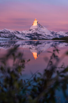 Matterhorn reflected in Stellisee at sunrise, Zermatt