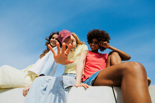 Joyful friends enjoying summer outdoors