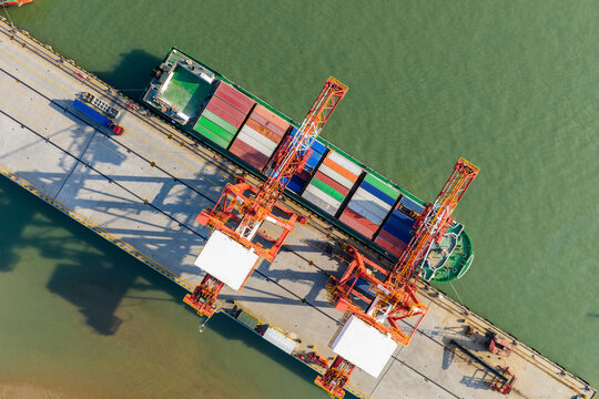 Container ship at industrial port