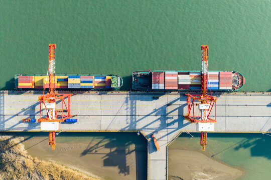 Container ship at industrial port