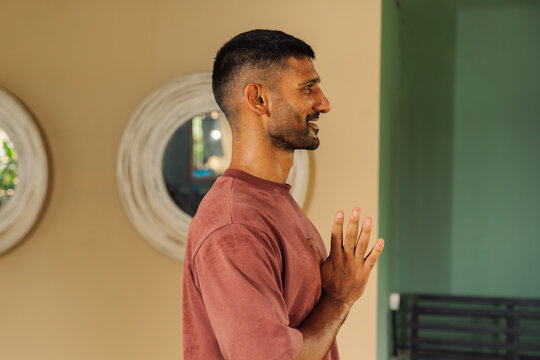 Yoga Practice With a Man Indoors in a Wellness Center