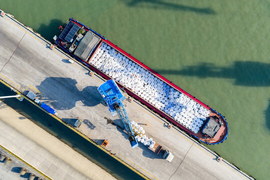 Cargo ship loading at port