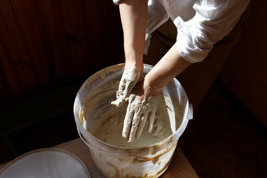 woman working with clay
